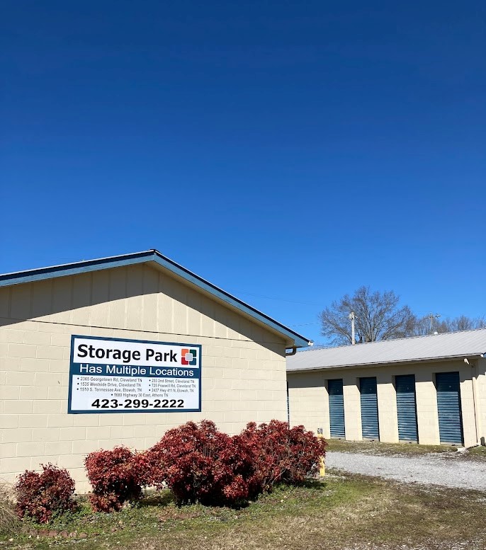 Storage Park office building with multiple-locations sign and drive-up units at Etowah South
