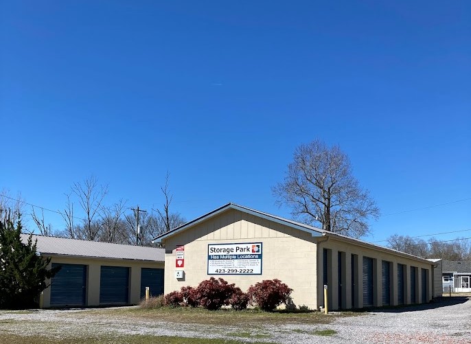 Storage Park Etowah South buildings with rows of blue drive-up unit doors